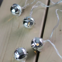 Northlight Silver Jingle Bell LED Christmas Lights - 3' Clear Wire - 8ct -Northlight GUEST a76f358b 15f6 4bfe 9625 1a16500d0ef5