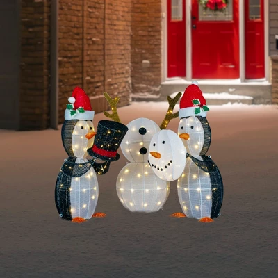 Northlight LED Lighted Penguins Building Snowman Outdoor Christmas Decoration - 35" - Set Of 3 3 Northlight LED Lighted Penguins Building Snowman Outdoor Christmas Decoration - 35" - Set Of 3