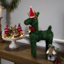 Northlight Reindeer With Santa Hat, Bell And Bow Artificial Pine Christmas Decoration - 16" -Northlight GUEST ae420e9d b2fc 49b5 8740 8bf48e7dd626